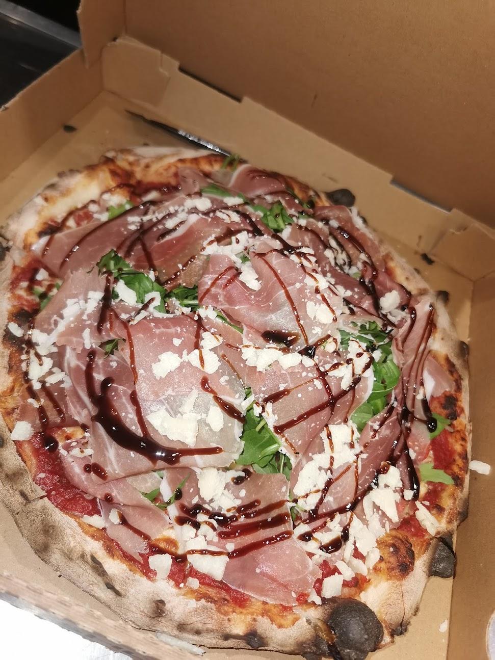 Photo de Gusto Della pizza