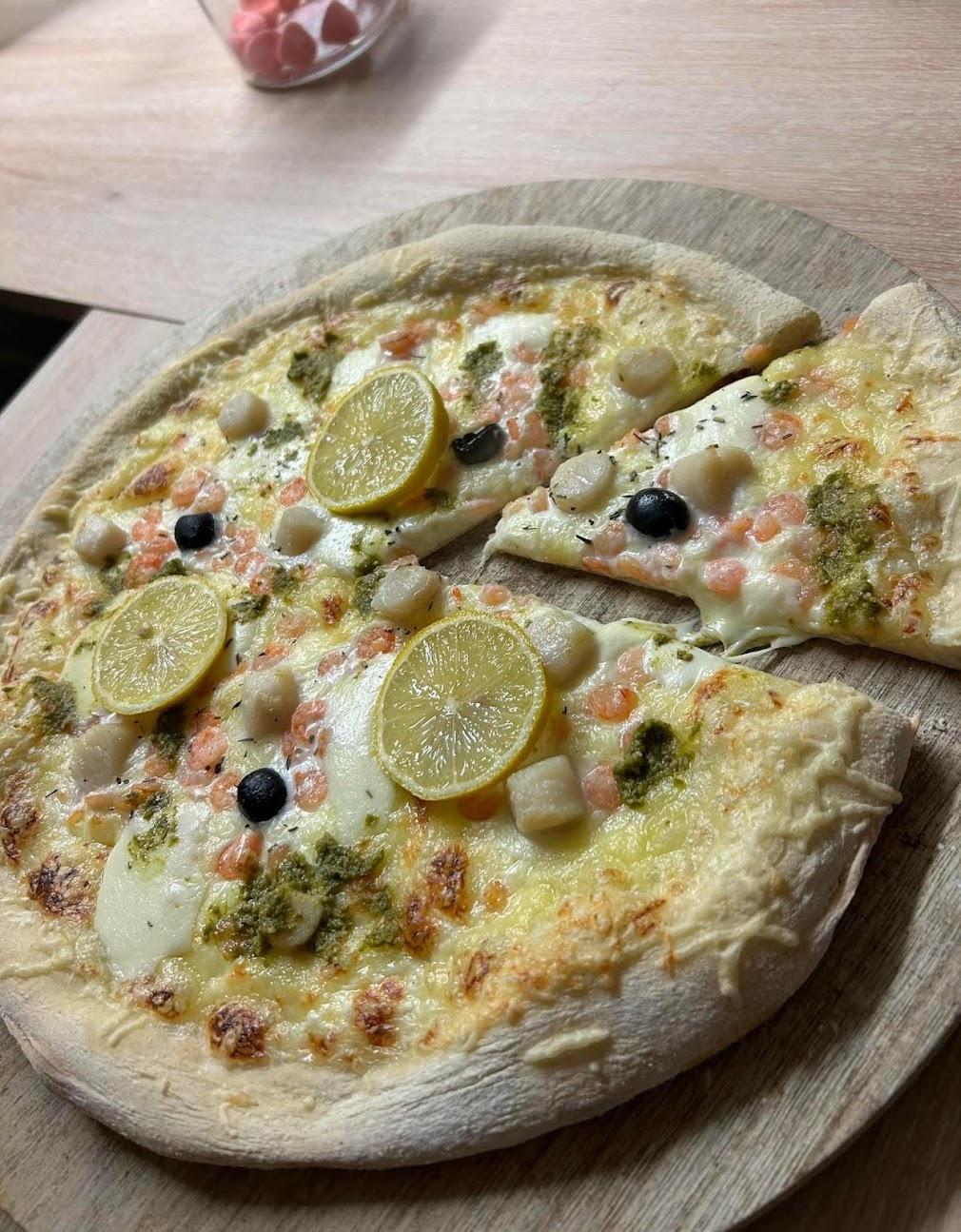 Photo de Le comptoir a pizzas