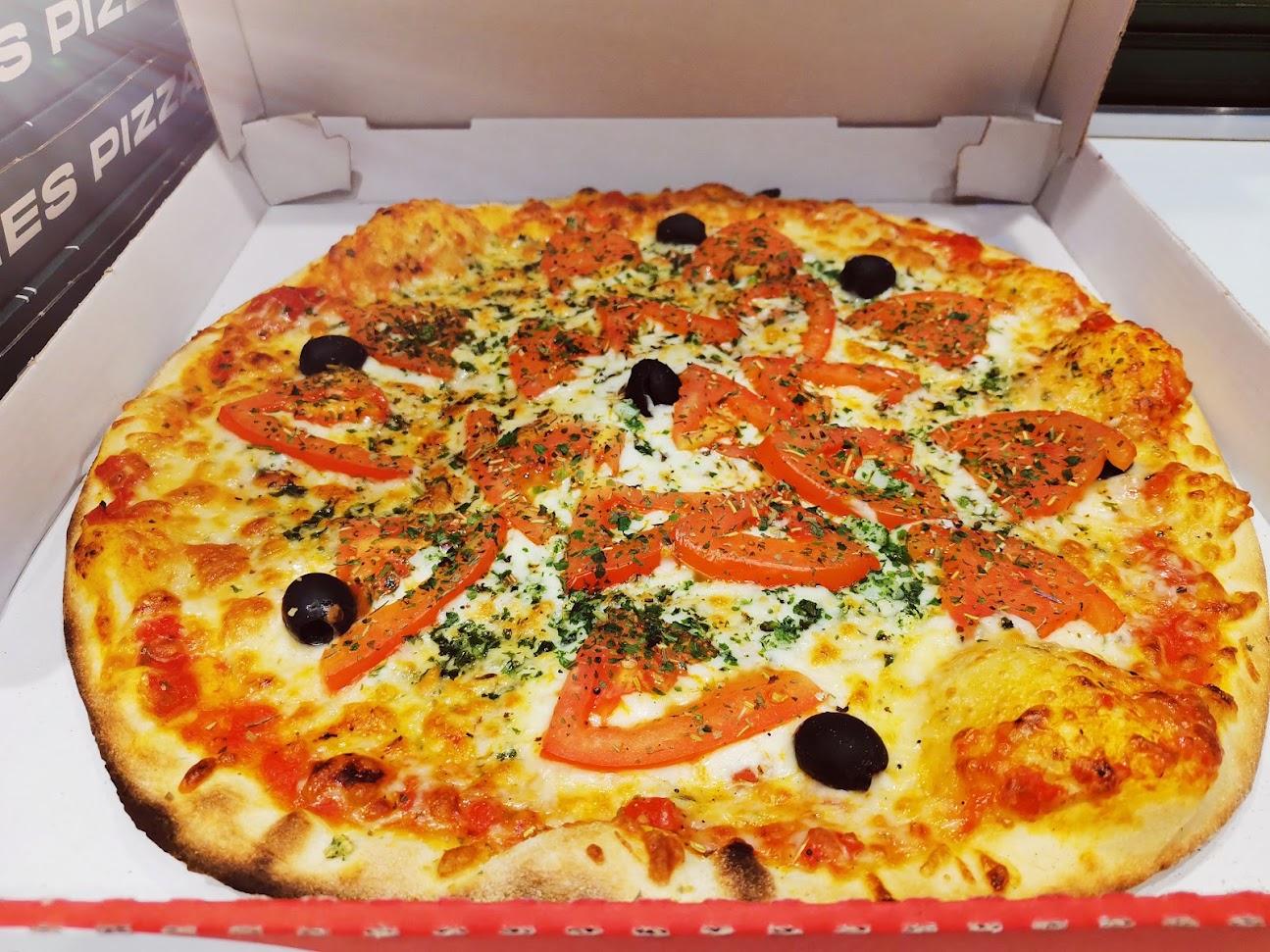 Photo de Kiosque à pizzas