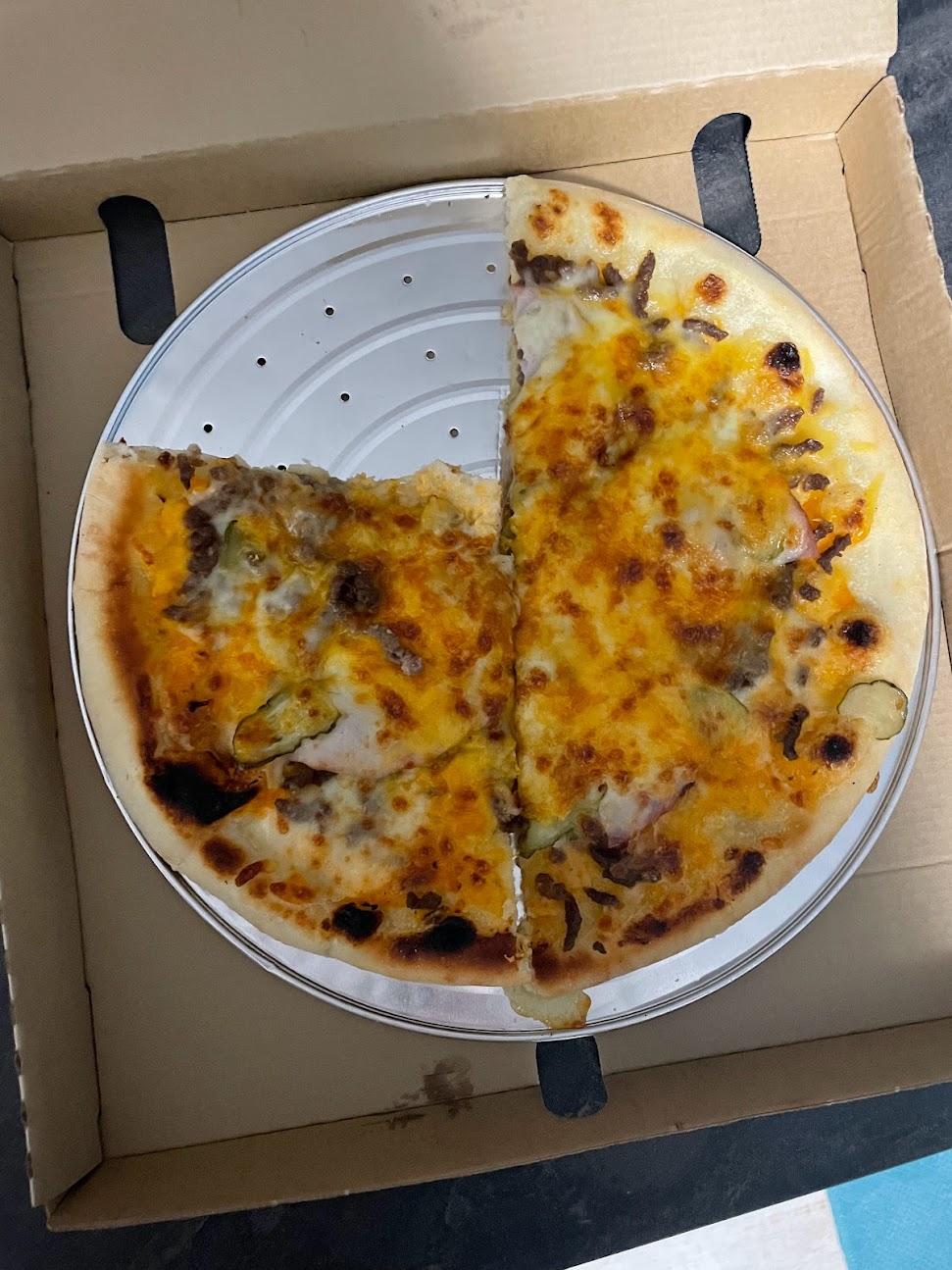 Photo de Just Queen - Distributeur de pizzas